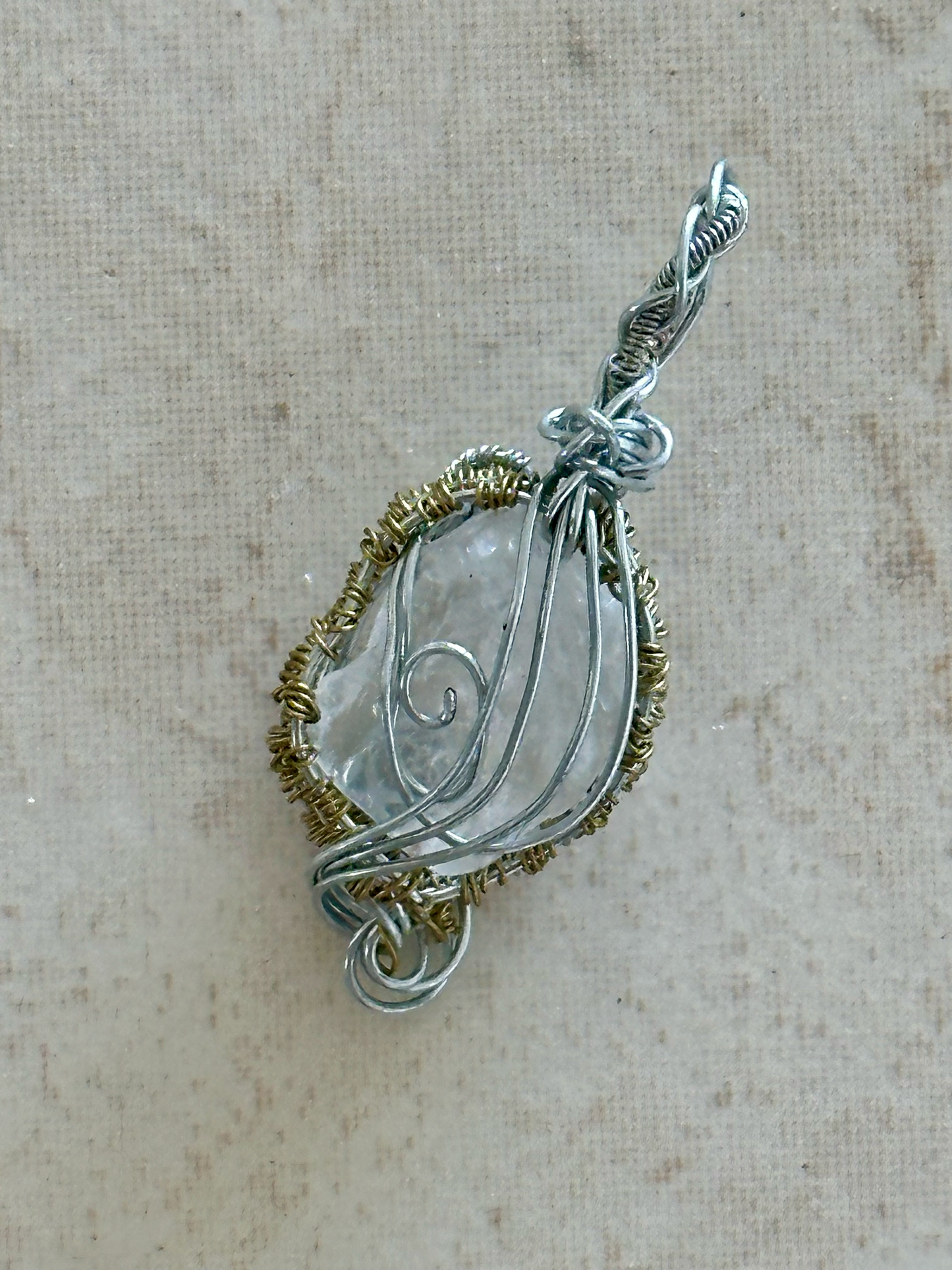 Stunning Clear Crystal Pendant with Intricate Wire Detailing