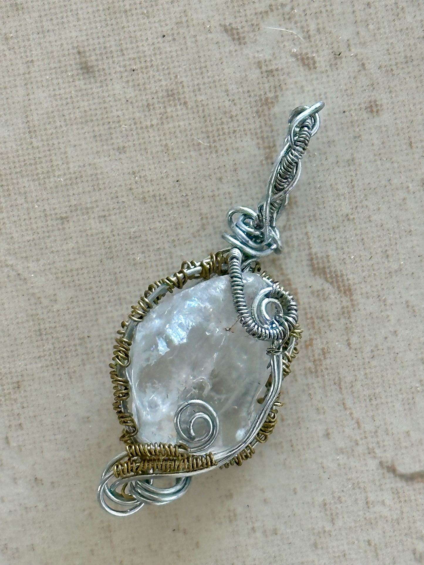 Stunning Clear Crystal Pendant with Intricate Wire Detailing